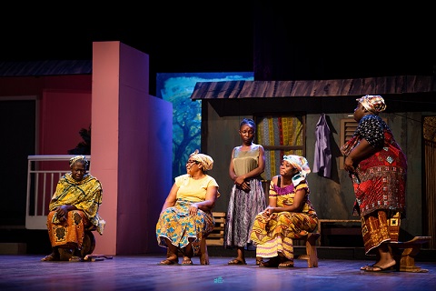 Scene from Dilemma of a Ghost play featuring Ato and Eulalie navigating cultural tensions on stage at the National Theatre, Accra.