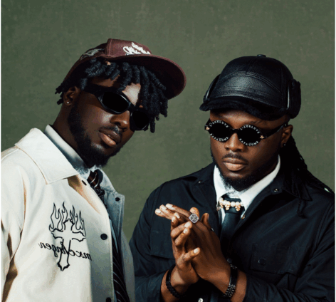 DopeNation twin duo posing in stylish outfits to promote their GhanaPiano album release.