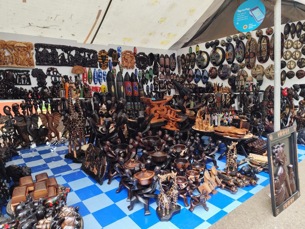 Artisans display handcrafted items at the Ashanti Regional CNC 2025 Arts and Craft Exhibition in Kumasi.