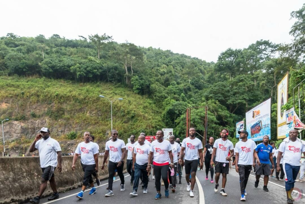 Walk With Lexis participants climbing Aburi Mountain